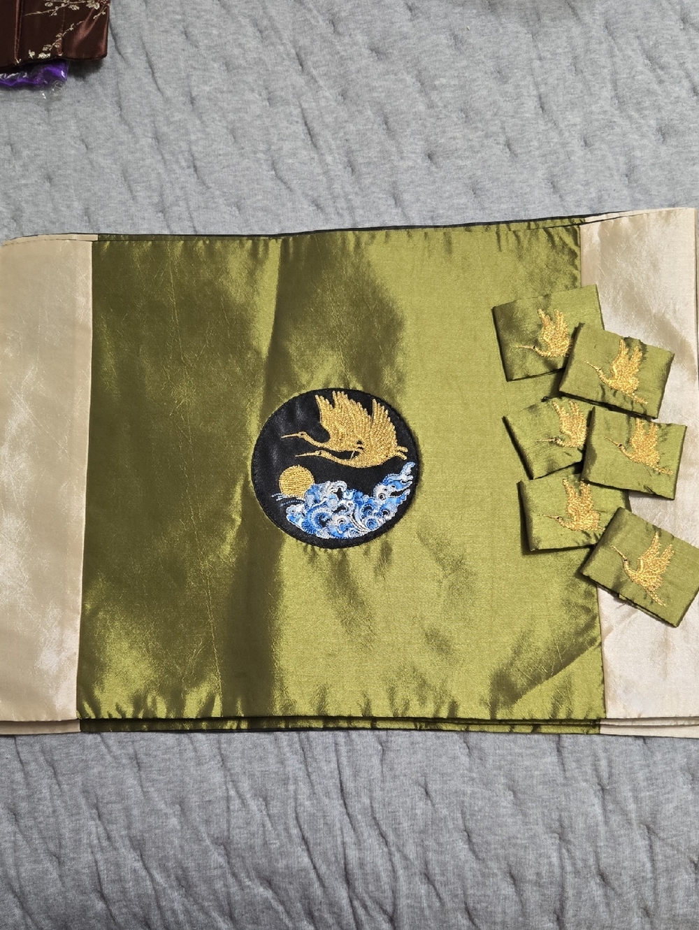 Set Of 6 Olive Green Silk Placemats with Embroidered Crane Motif With Rings